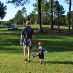 grandson miles golfing